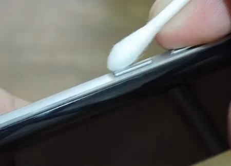 Check if the Volume button has dirt or debris on it